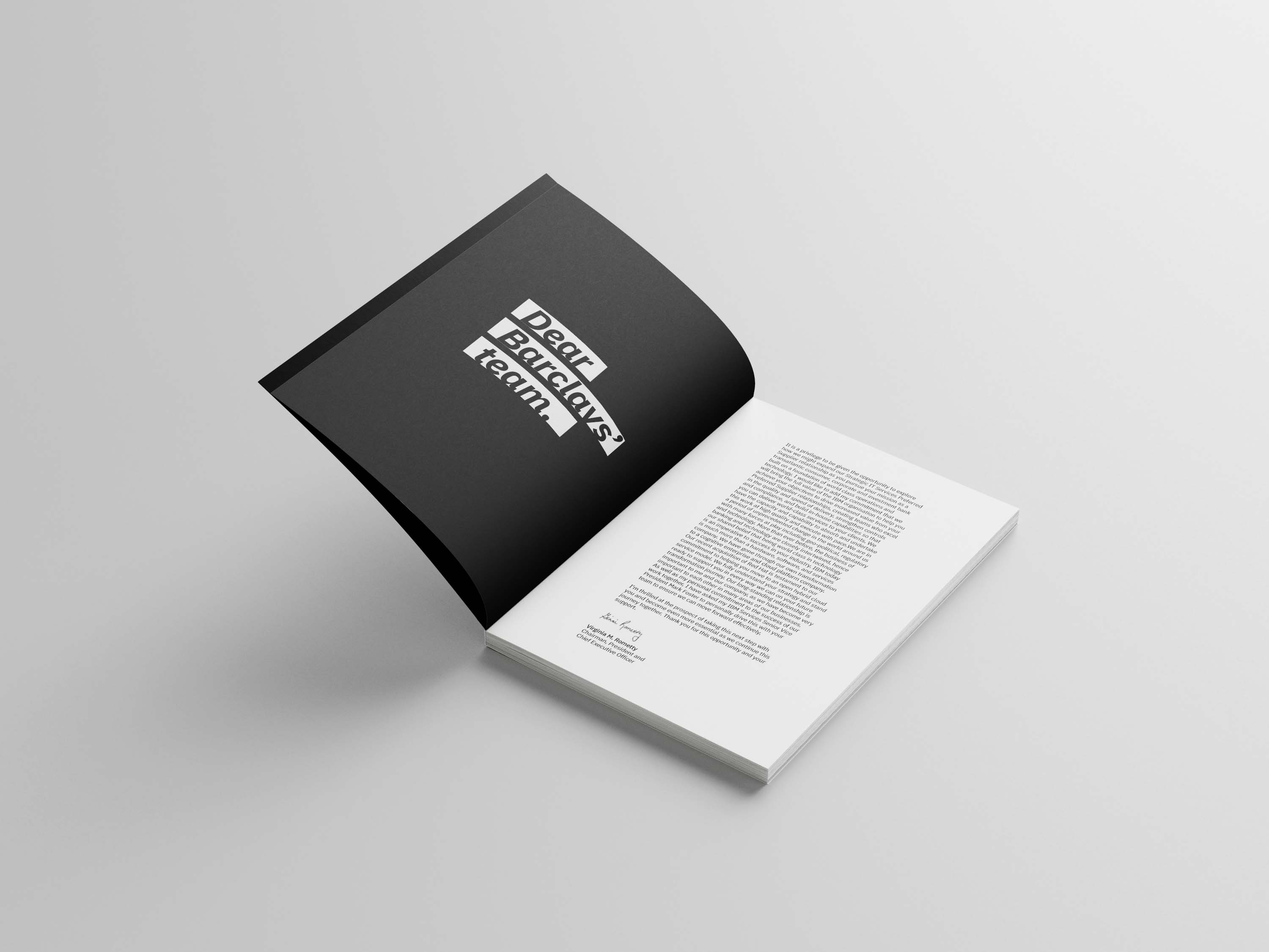 Graphic of a typography specimen showing the alphabet and numerals on top of a dark gray background.